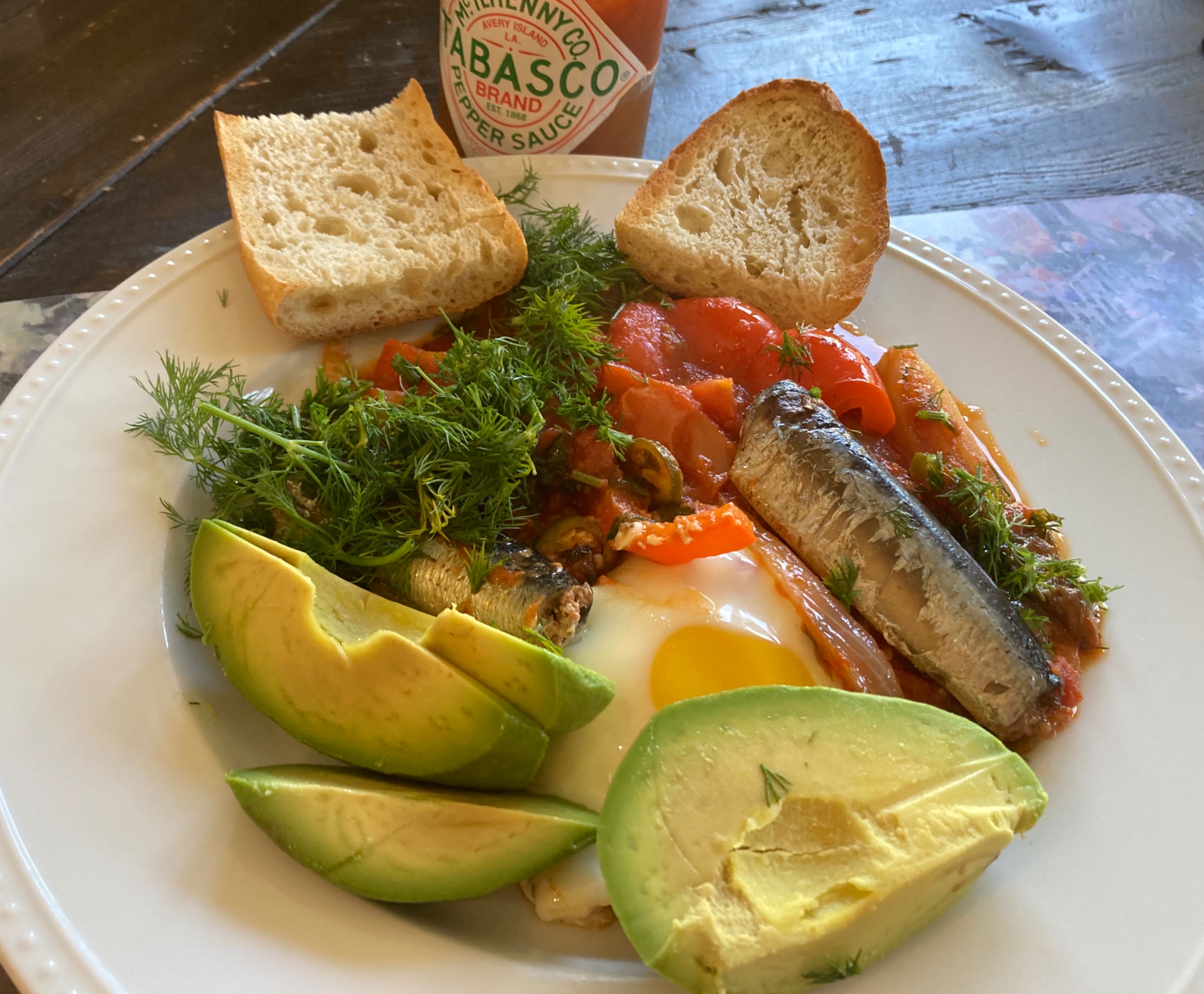Sardine shakshouka with avocado