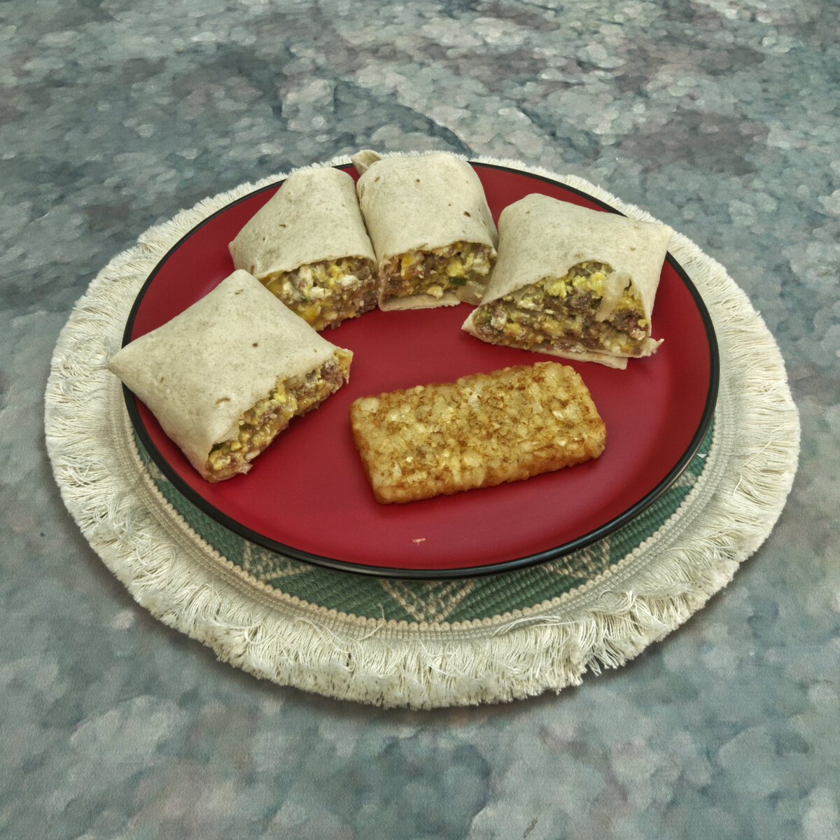 Sausage, Egg and Cheese Breakfast Burritos with a Hash Brown Patty