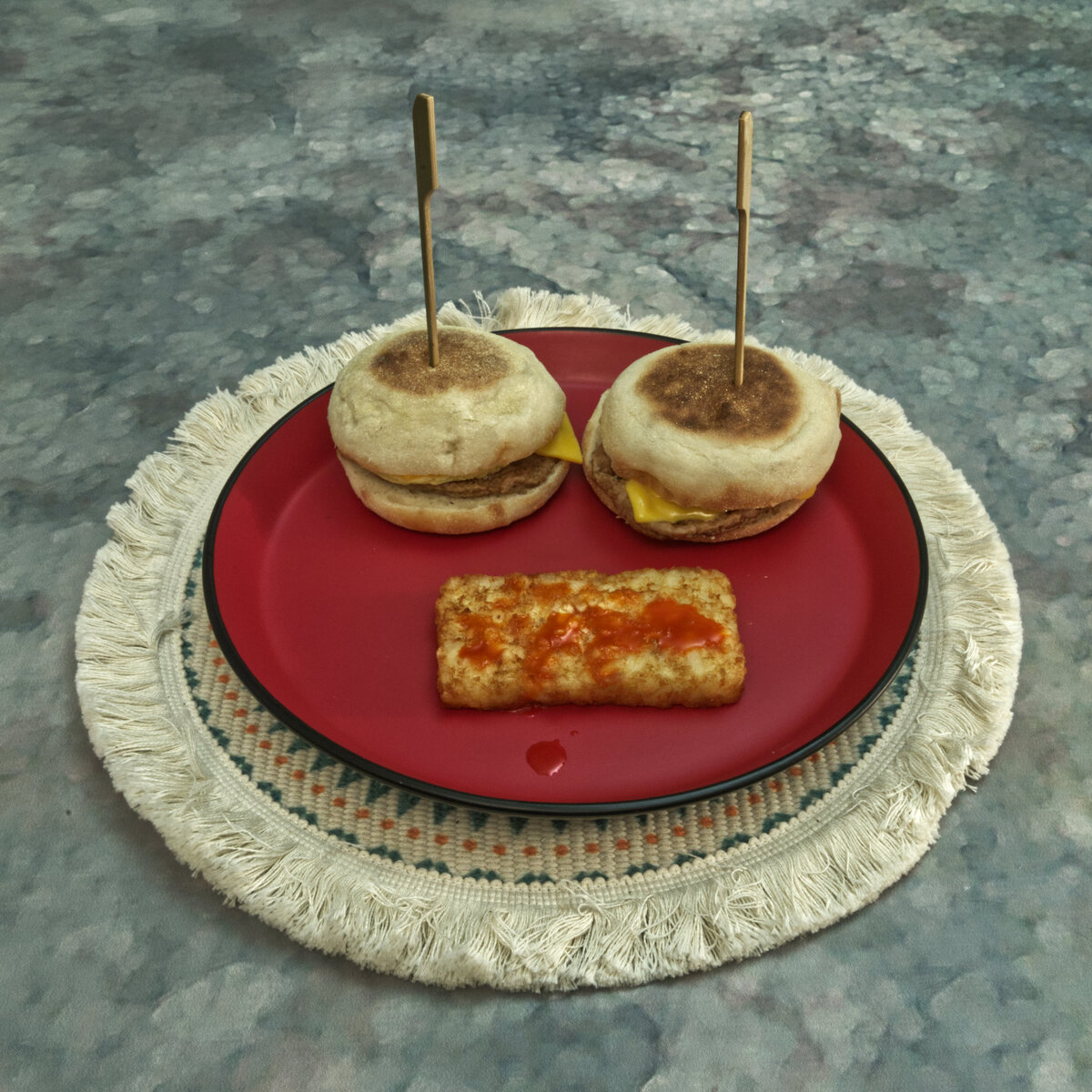 Sausage, Egg and Cheese Breakfast Muffins with a Hash Broiwn Patty