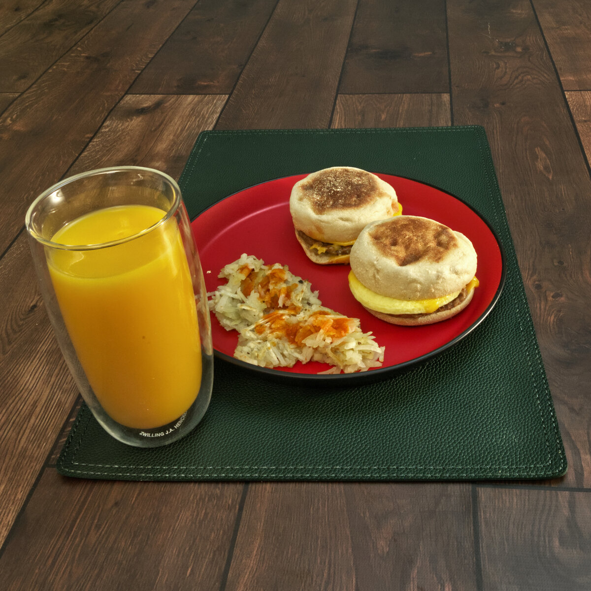 Sausage, Egg and Cheese Muffins with Hash Browns and Orange Juice