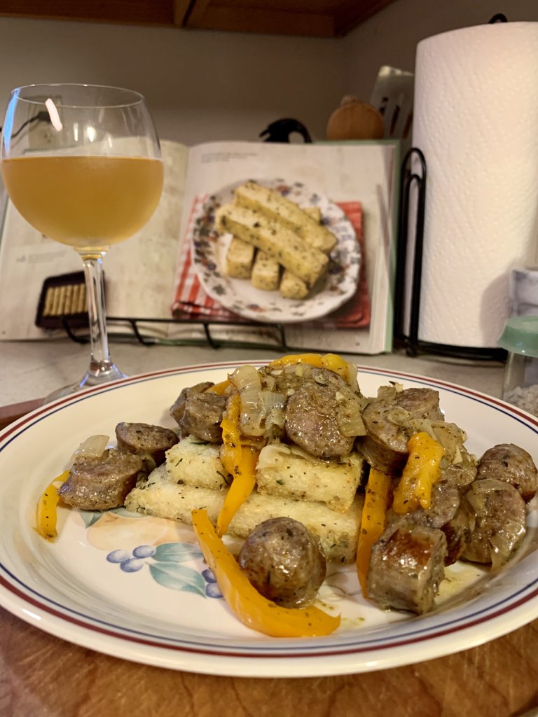 Sausage, Peppers, And Onions Over Broiled Polenta