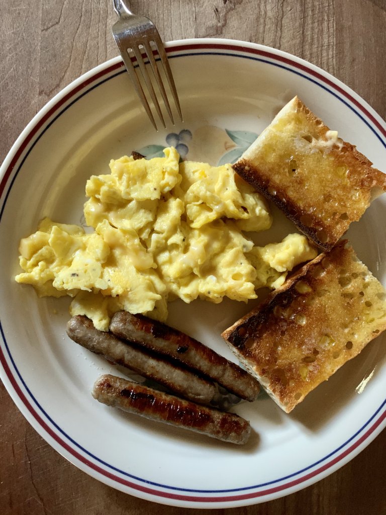 Scrambled Eggs With Cheese And Sausages