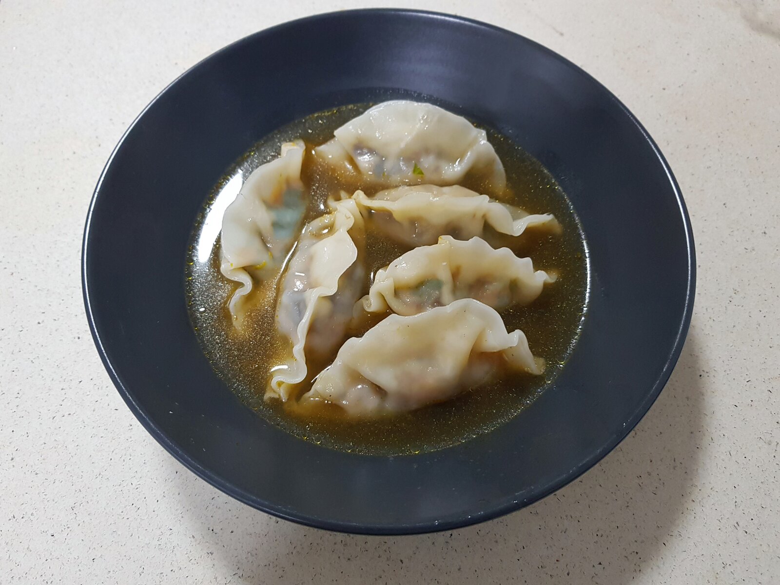 Served in a mushroom miso broth