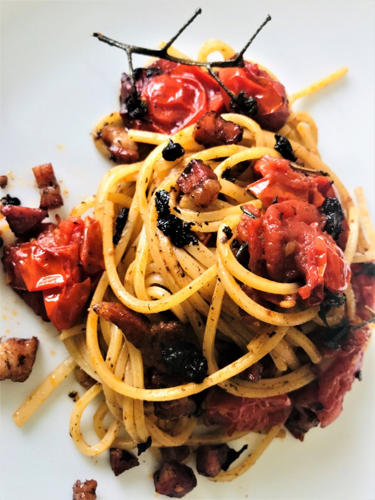 Spaghetti with baked tomatoes, black garlic and Guanciale.jpg