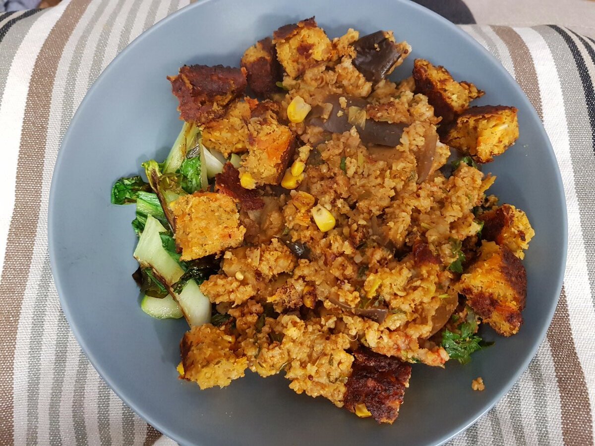 Spicy Aubergine Rice with vegan burger and bok choy