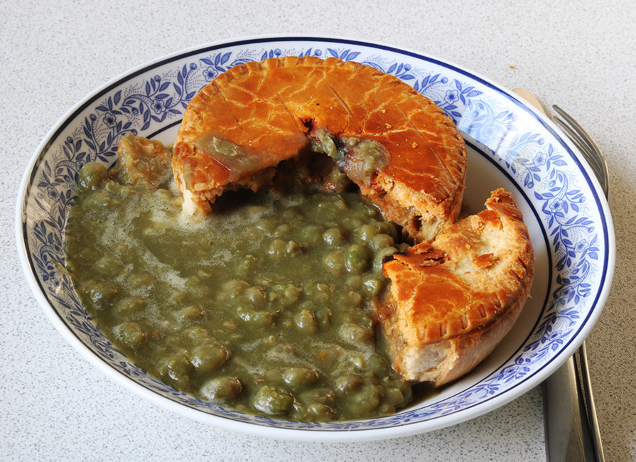 Steak and kidney pie with mushie peas.