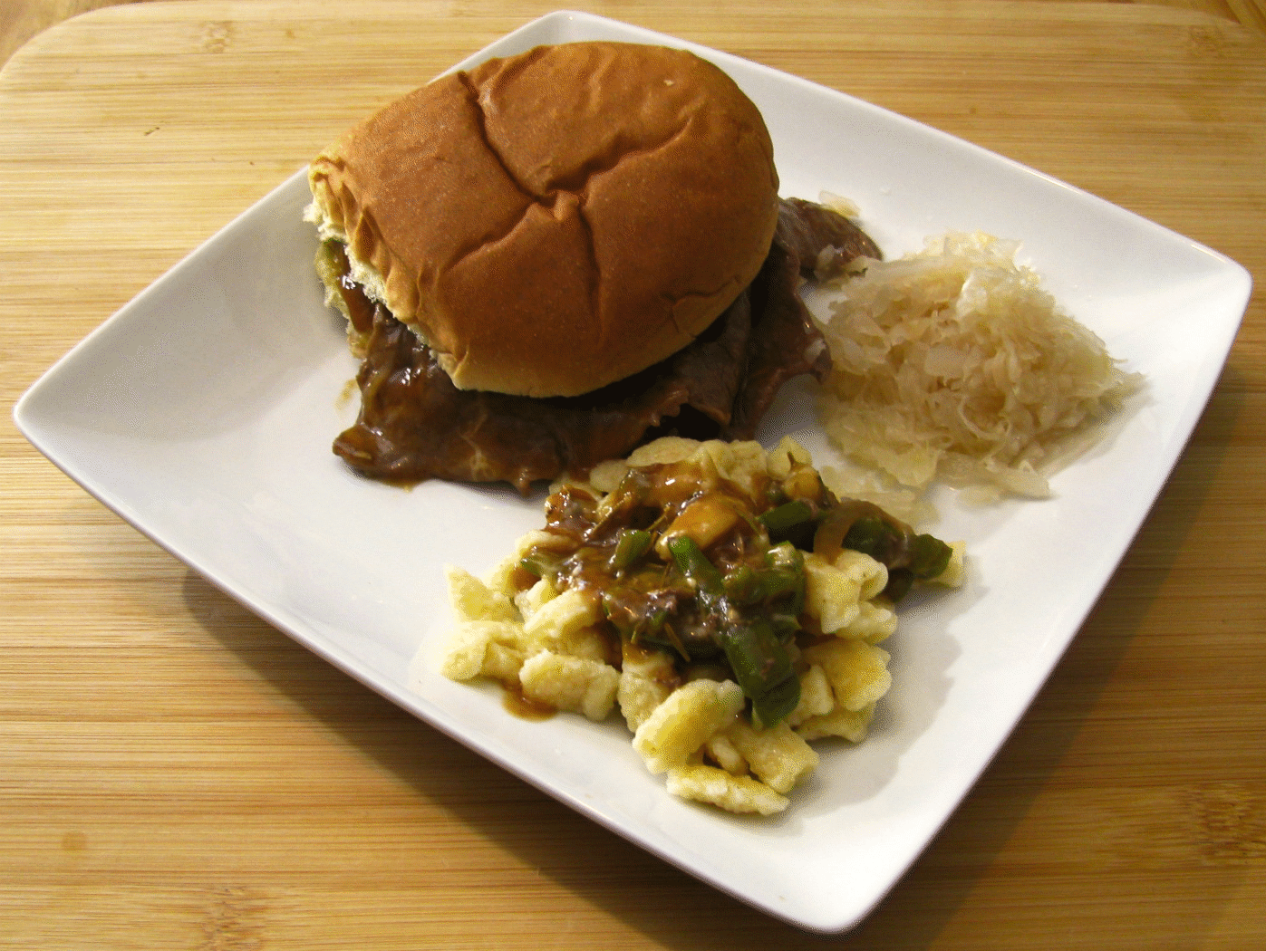 Steak with Onions, Peppers and Cheese Gravy Sandwich