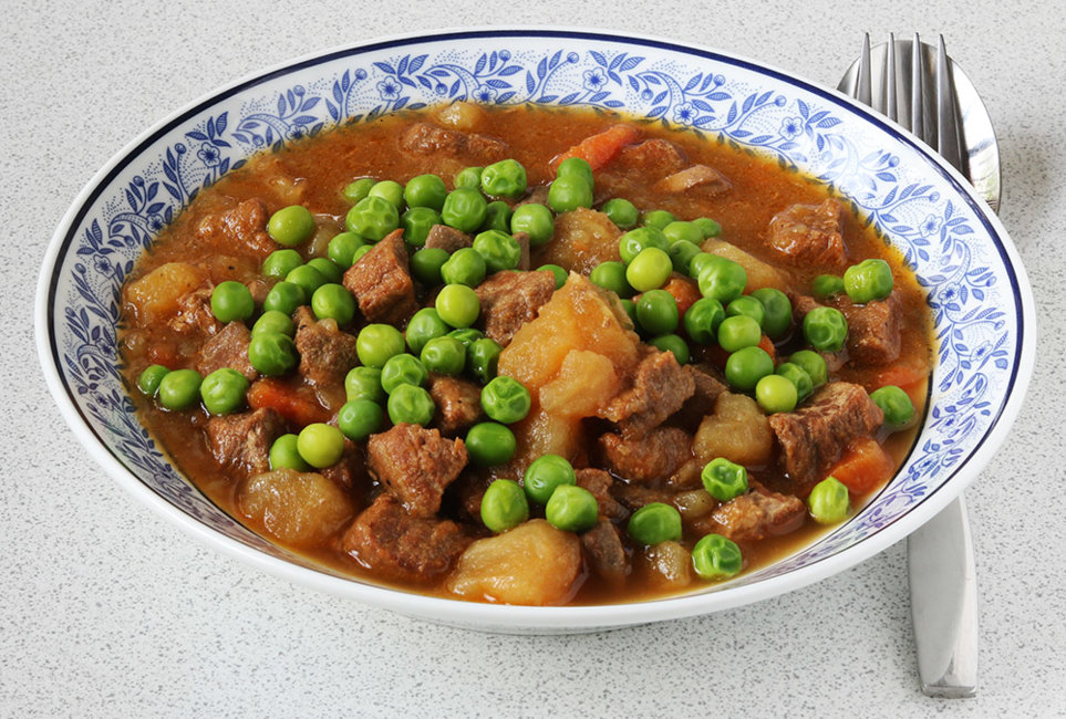 Stew with peas (reflected).