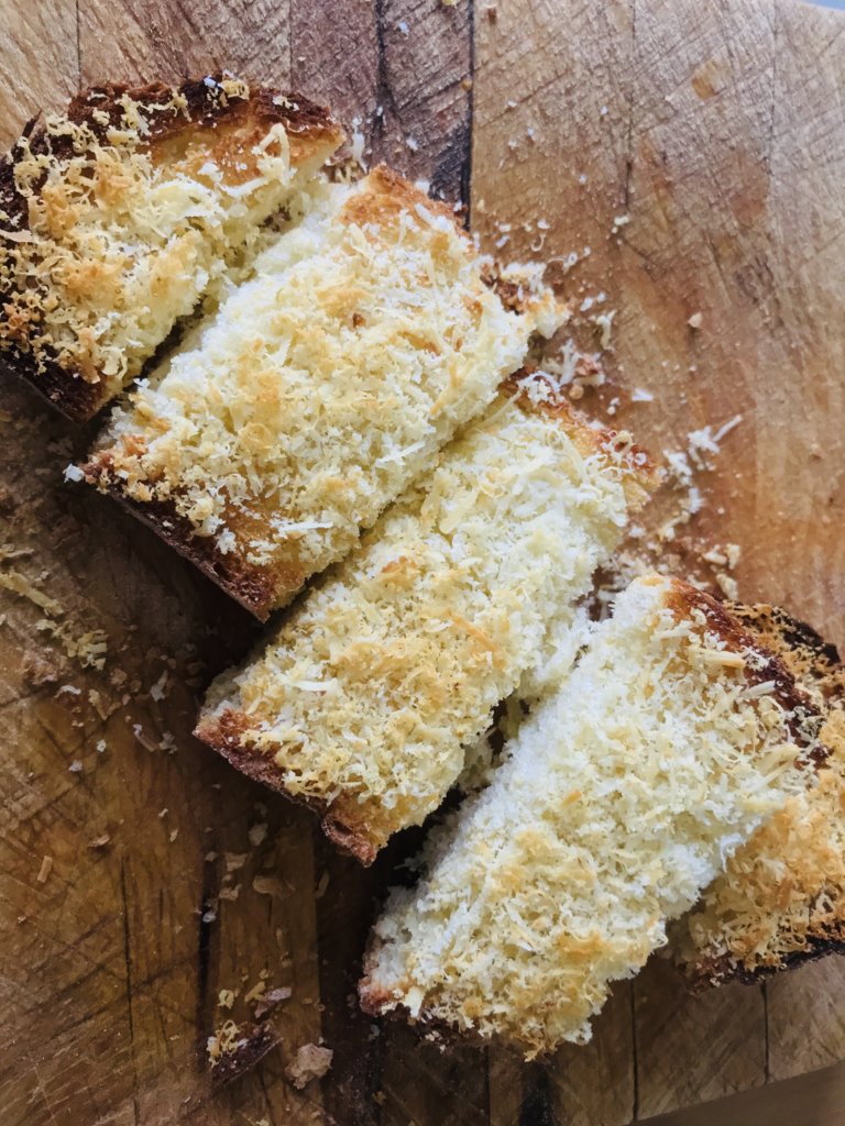 Toasted bread with grated Parmigiano and Black Pepper.jpeg
