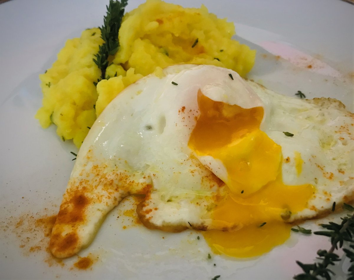 Turmeric-flavored mashed potatoes and fried egg.jpg