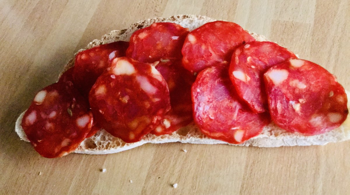 Tuscan bread slice with spicy salame.jpeg