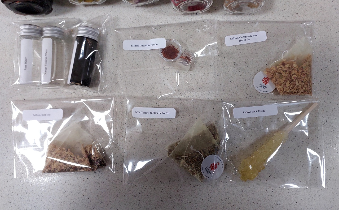 Various herbal saffron tea bags plus sample sizes saffron threads and saffron powder