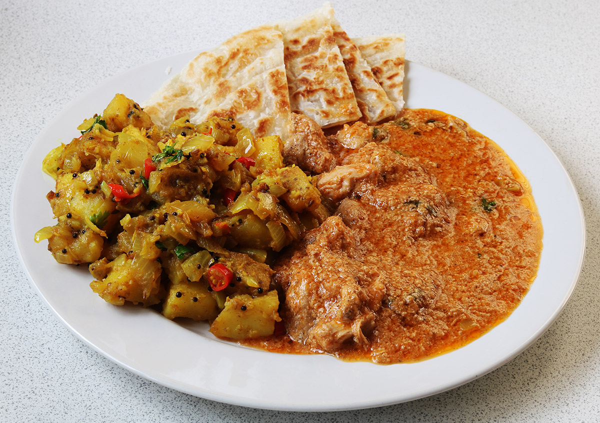 With hot and sour potatoes and roti s.jpg
