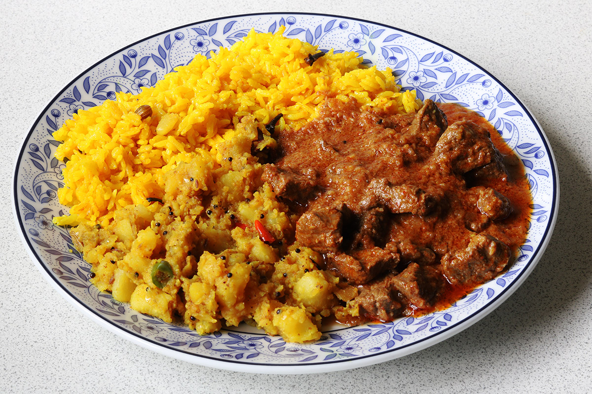 With hot and sour potatoes and yellow rice s.jpg