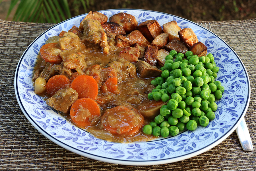 With roast potatoes (beef dripping) and peas.