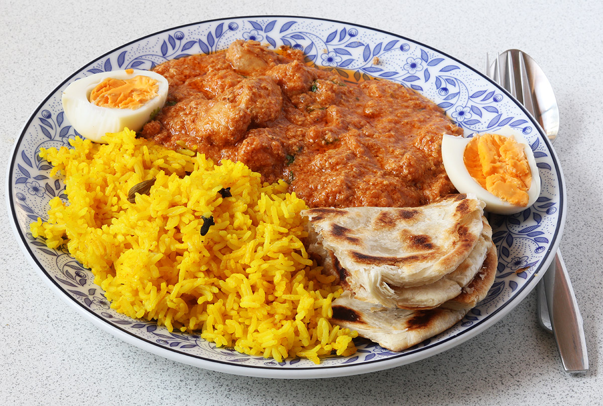 With yellow rice and roti s.jpg